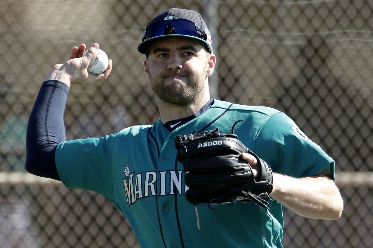 Mariners starting pitcher Nathan Karns throws during a spring-training practice on Feb. 22 in Peoria, Ariz. Karns is battling James Paxton for the final spot in Seattle’s starting rotation.