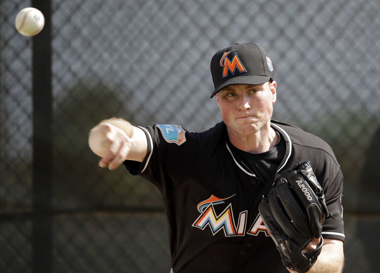 Miami Marlins pitcher Carter Capps throws a bullpen session Monday in Jupiter, Florida.