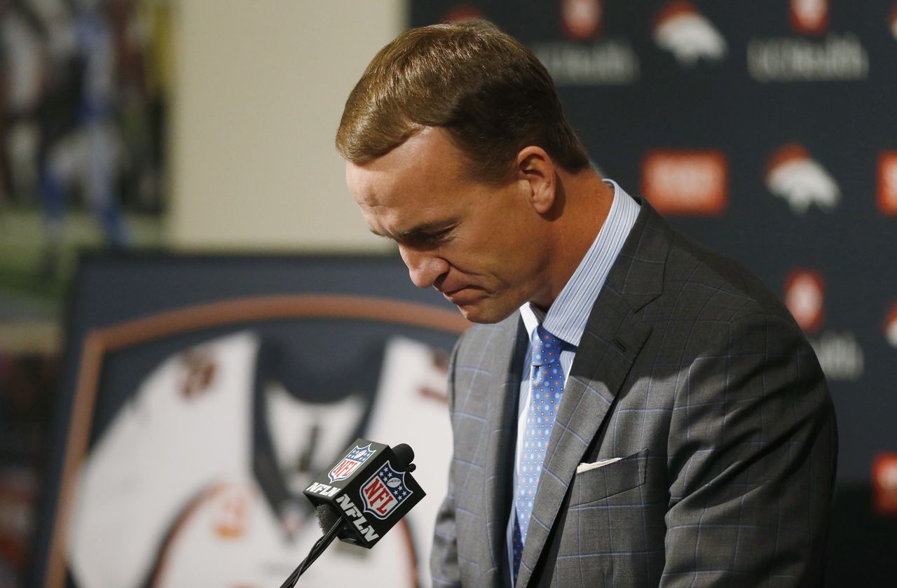 Denver Broncos quarterback Peyton Manning pauses to compose himself during his retirement announcement Monday at team headquarters in Englewood, Colorado.