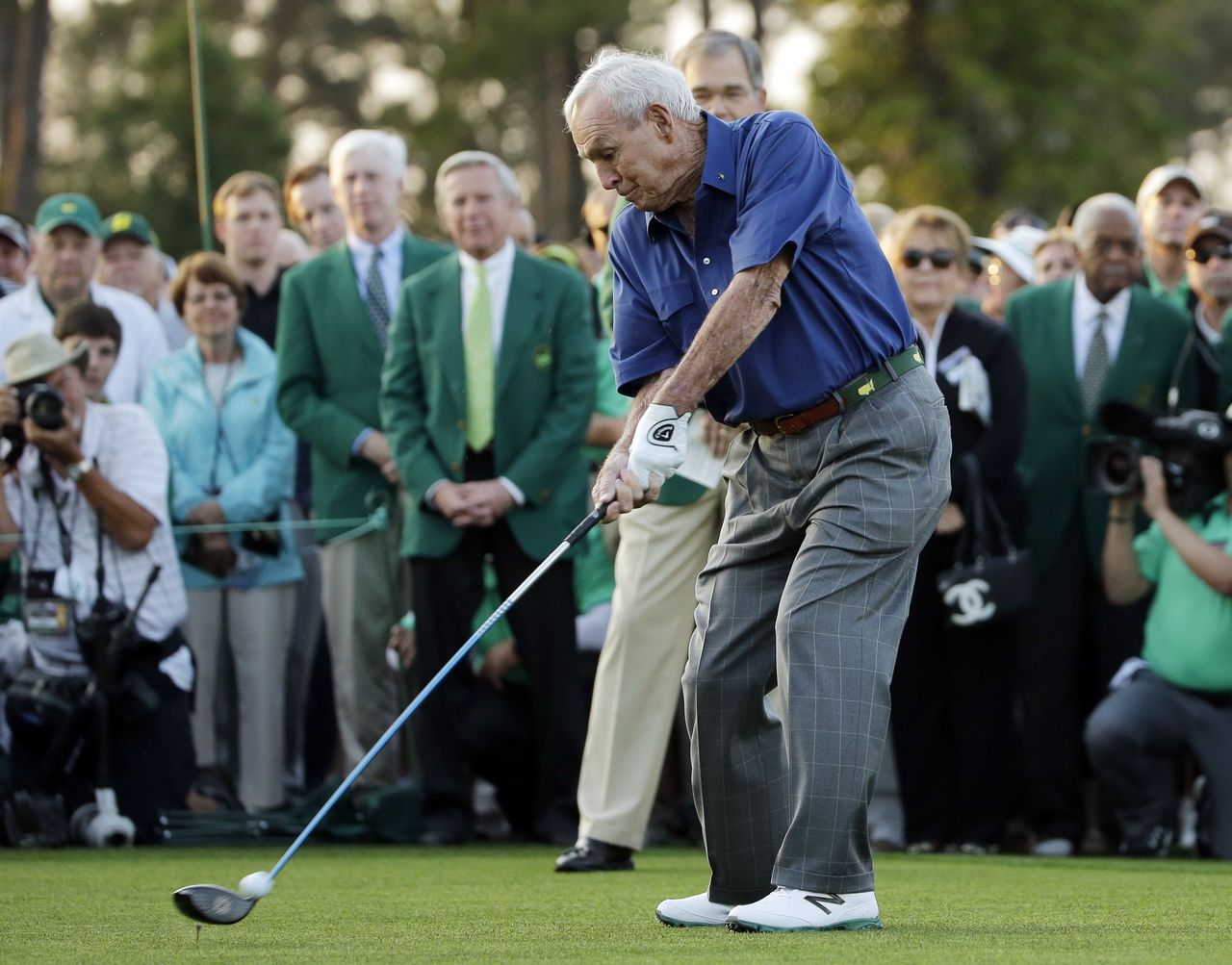 Arnold Palmer hits an honorary tee shot before the first round of the 2015 Masters golf tournament in Augusta, Ga. Palmer will be on the first tee to help start the Masters this year, but will not be hitting a ceremonial tee shot.