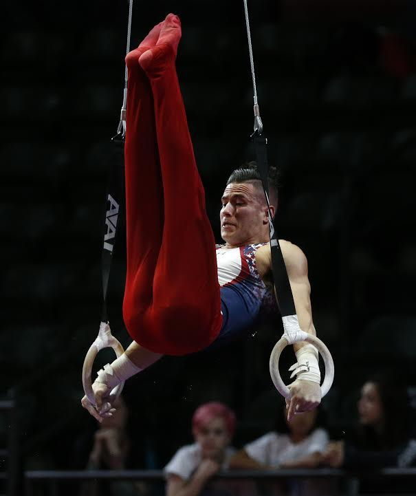The United State’s Alex Naddour holds a position during his routine on the still rings during the Pacific Rim Gymnastics Championships on Friday at Xfinity Arena in Everett.