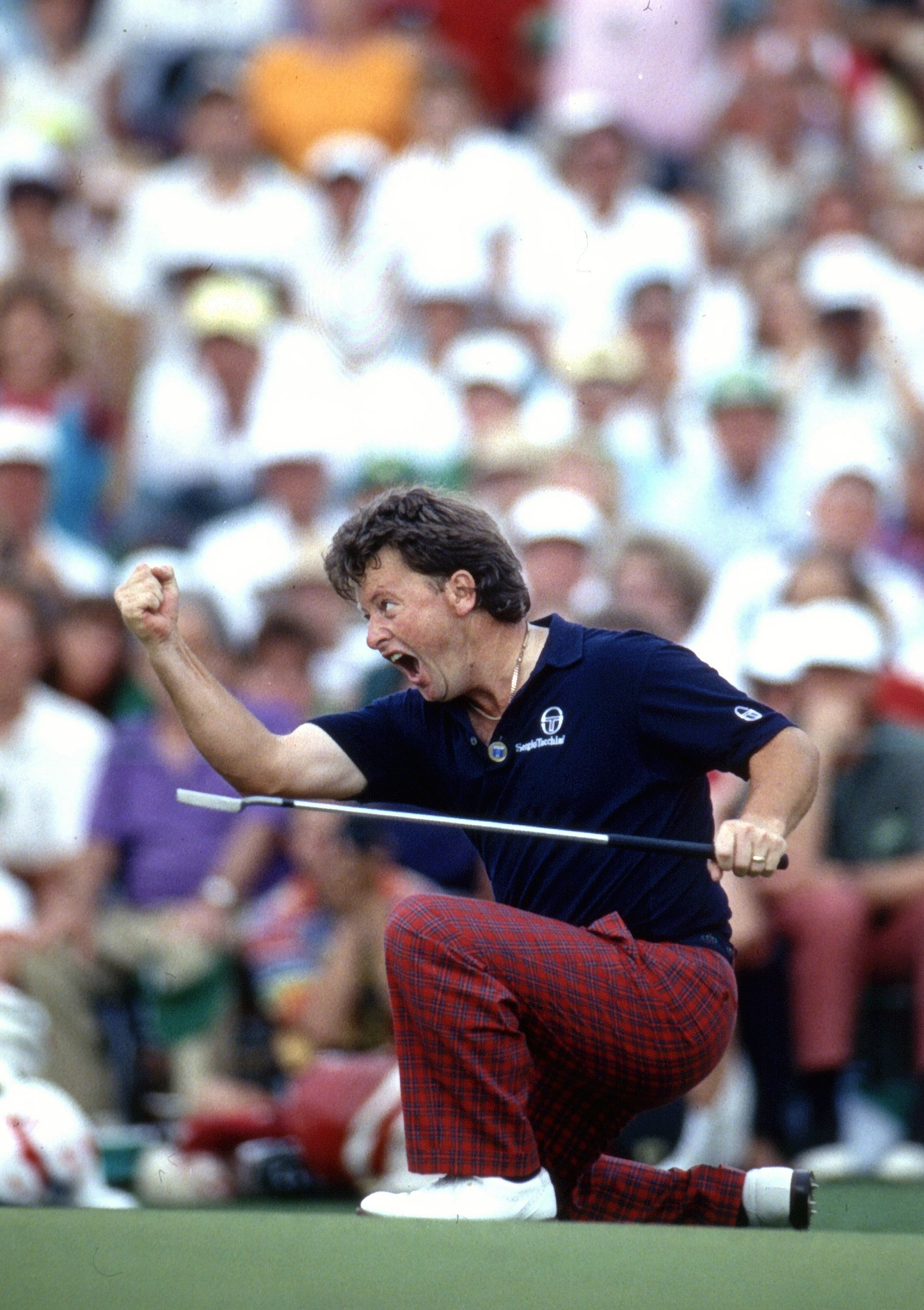 In this April 14, 1991 photo, Ian Woosnam, from Wales, reacts to his putt for par on the 18th green to win the Masters golf tournament at the Augusta National Golf Club in Augusta, Georgia.