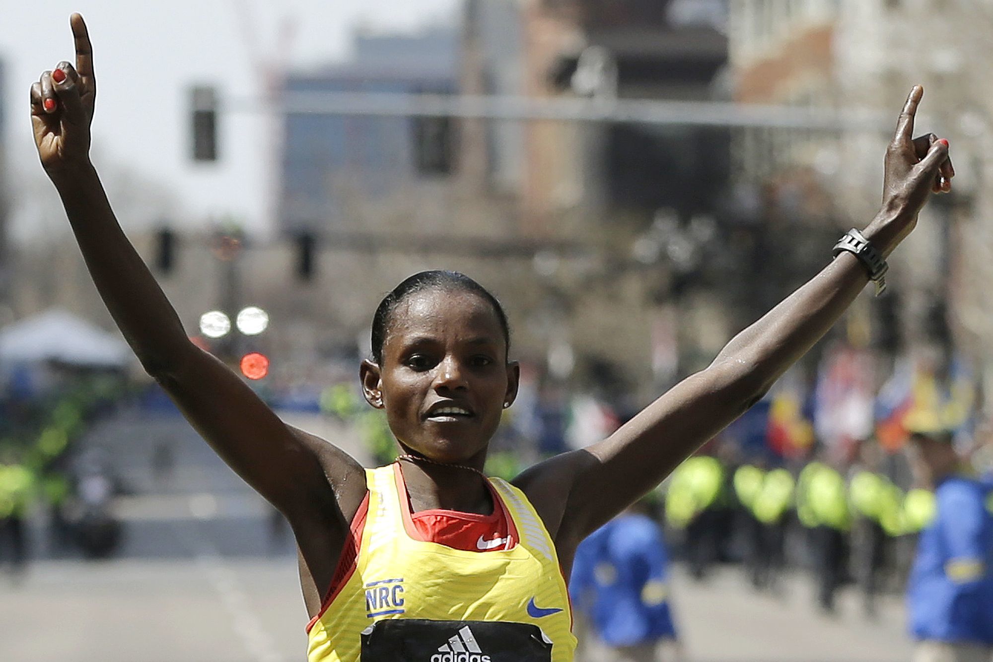 Associated Press Atsede Baysa of Ethiopia crosses the finish line to win the women’s division of the 120th Boston Marathon on Monday.