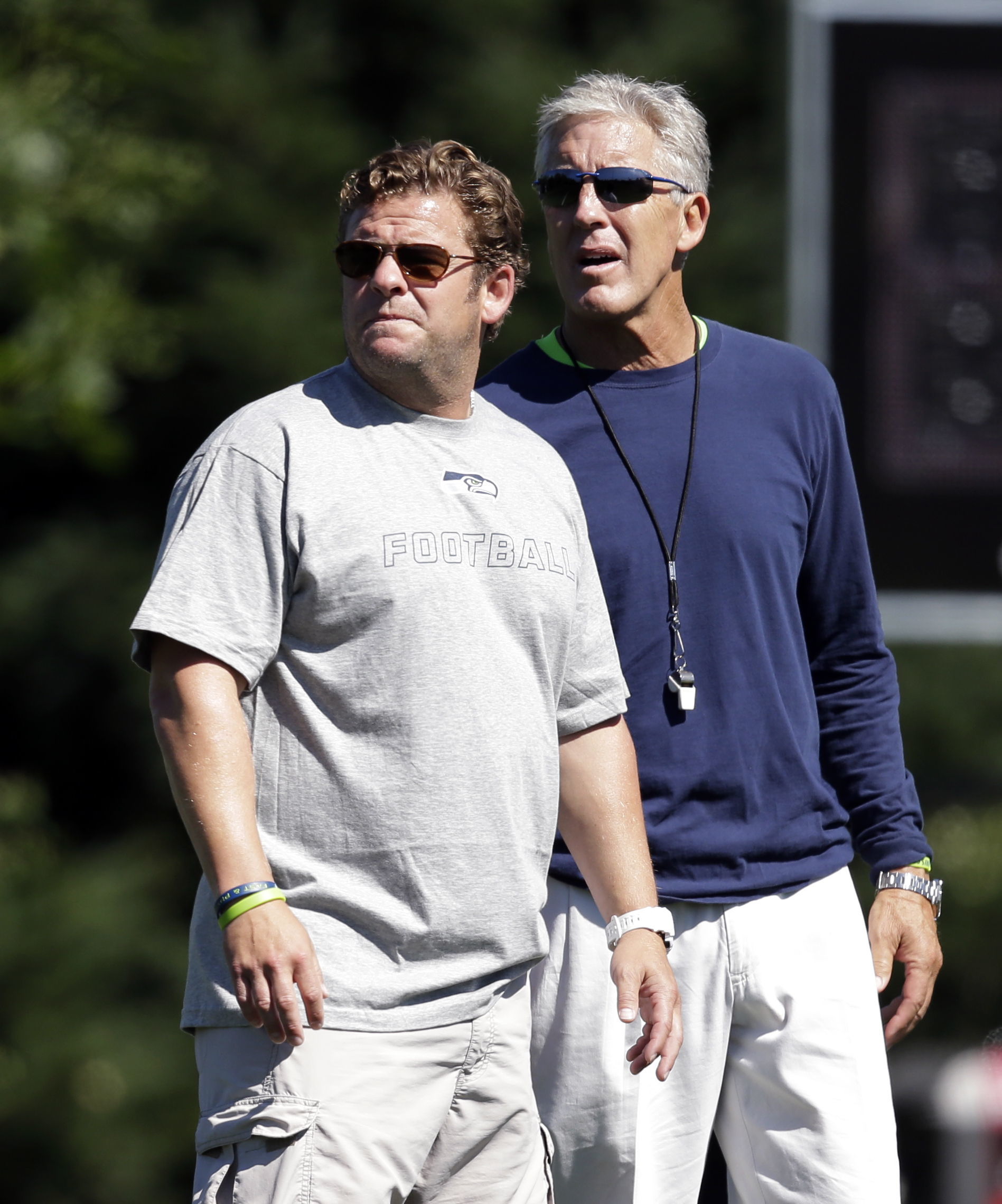 Seahawks head coach Pete Carroll (right) and general manager John Schneider did not talk specific in their pre-draft press conference Tuesday.