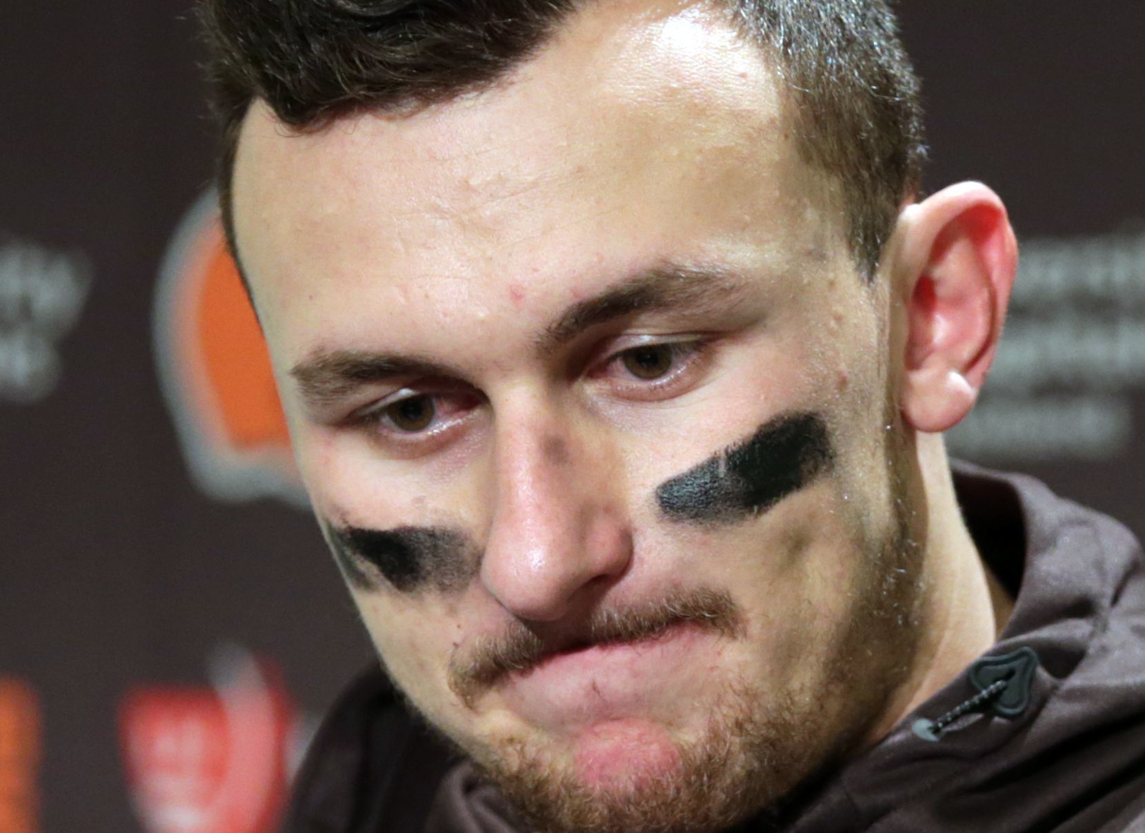 In this Dec. 20, 2015, photo, Cleveland Browns quarterback Johnny Manziel speaks with media members following the team’s 30-13 loss to the Seattle Seahawks in an NFL football game in Seattle.