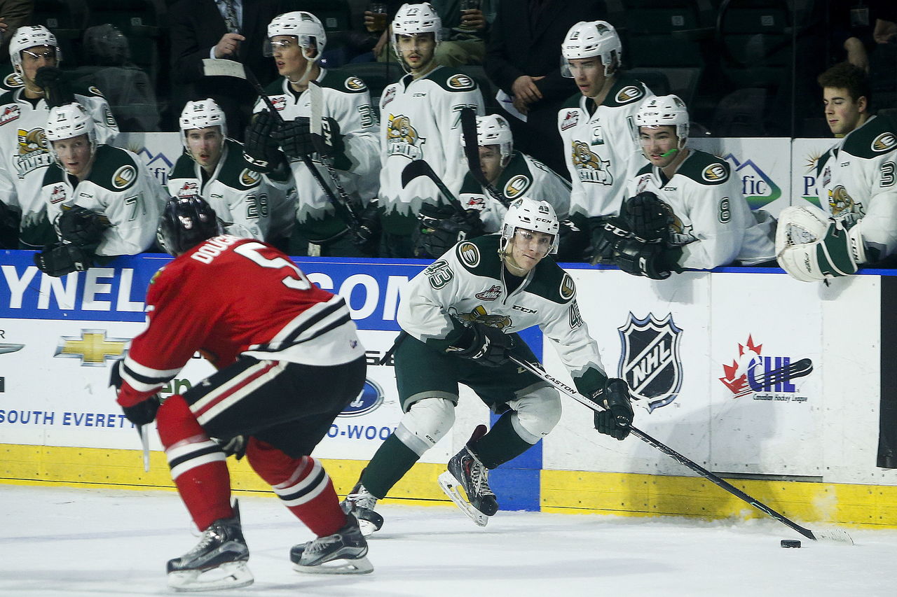 The Silvertips’ Connor Dewar flies down the wing in front of his team’s bench during a game against Portland on March 8 at Xfinity Arena in Everett.