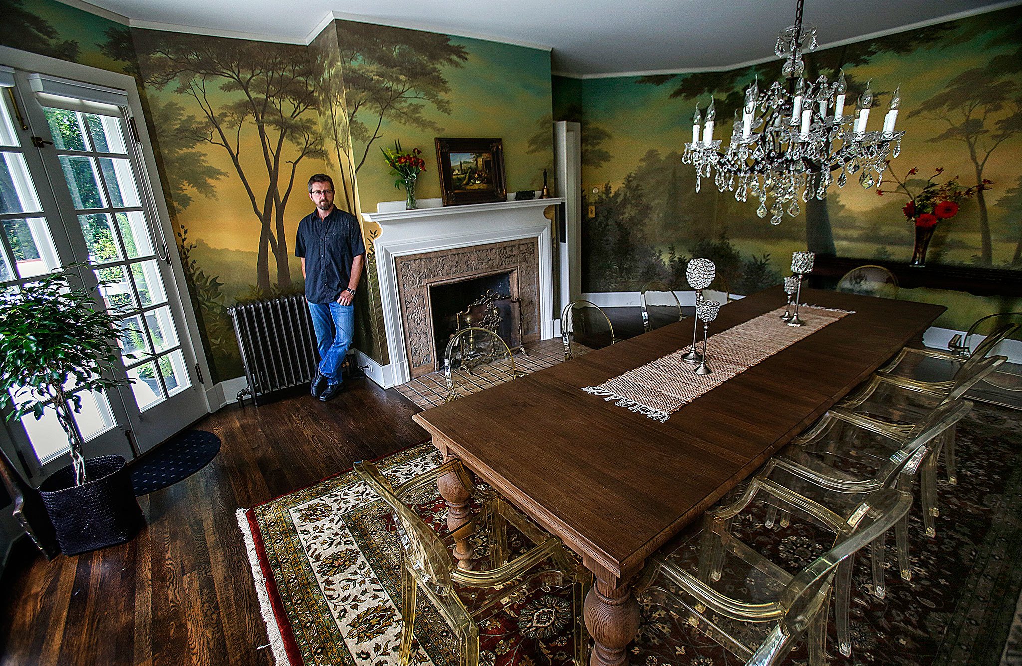 Artist Andy Eccleshall paints unique, one-of-a-kind murals, including this one extending all the way around the large formal dining room in the home of Jennifer and Donald Kaump. (Dan Bates/The Herald)