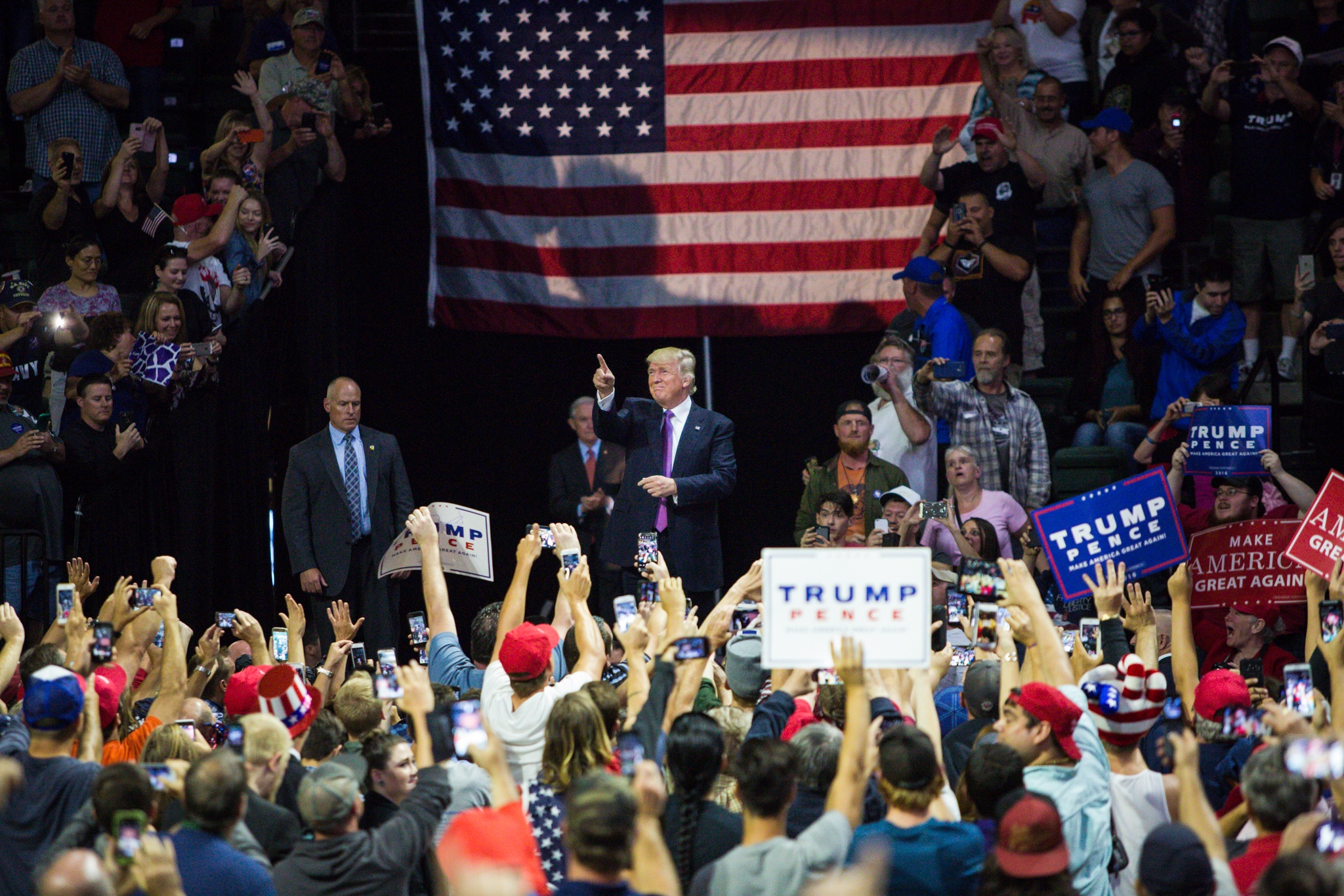 Republican presidential nominee Donald Trump makes his entrance during a rally at the Xfinity Arena in Everett on Tuesday. (Daniella Beccaria / For The Herald)