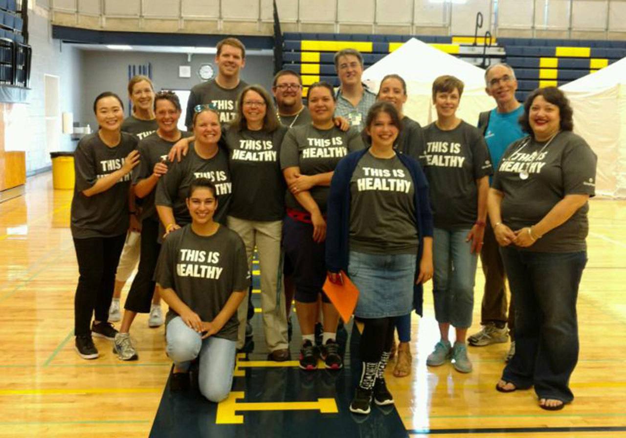 Group Health medical staff provided free physicals to 139 student athletes on Aug. 13 at Everett High School. (Contributed photo)