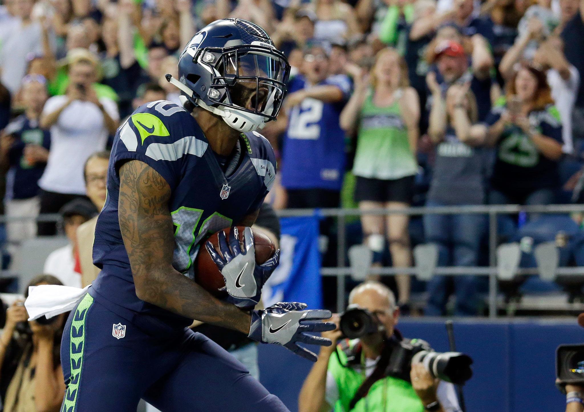 Seahawks wide receiver Paul Richardson celebrates after scoring a touchdown against the Cowboys in the first half of a preseason game Aug. 25 in Seattle. (AP Photo/Elaine Thompson)