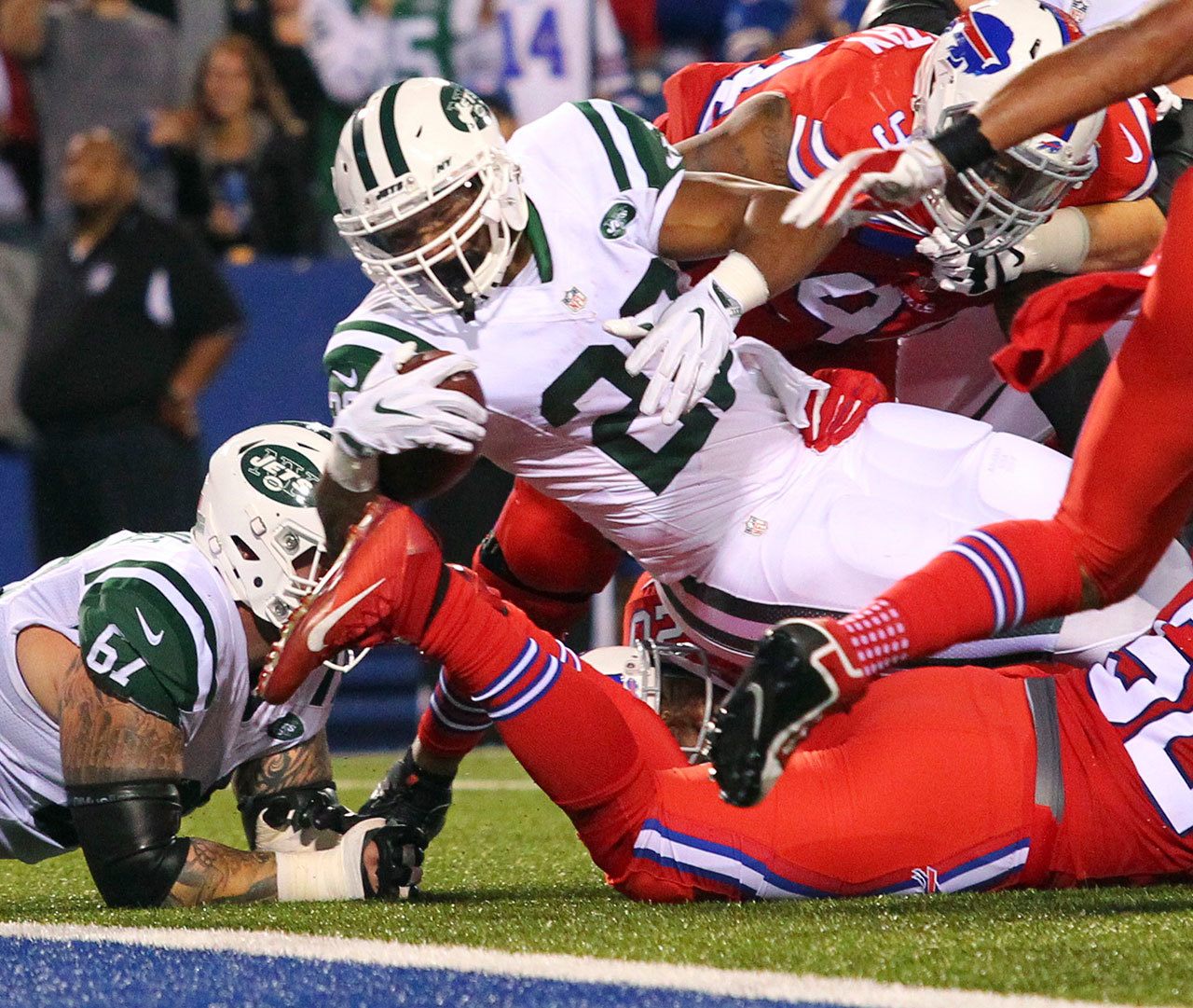 Jets running back Matt Forte (22) dives for a touchdown during the first half of a game against the Bills on Thursday in Orchard Park, N.Y. (AP Photo/Bill Wippert)