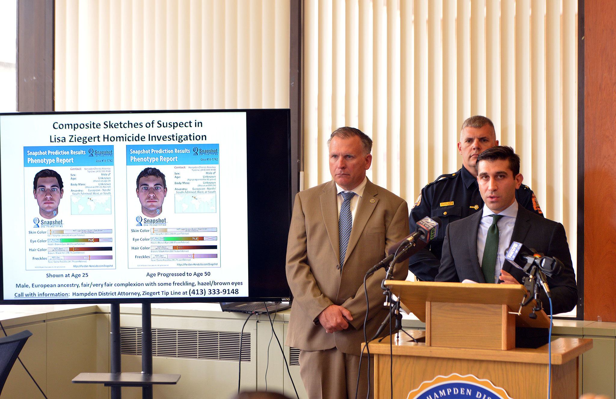 Hampden County District Attorney Anthony Gulluni shows a composite sketch made of a suspect from state-of-the-art DNA analysis. (Don Treeger/The Republican)
