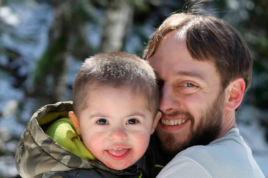 Caleb Hurley holds his son, Braeden, 3, in a photograph that will be included in a video to be shown in Times Square during the National Down Syndrome Society’s Buddy Walk in New York on Saturday. (Courtesy of Hurley Family)
