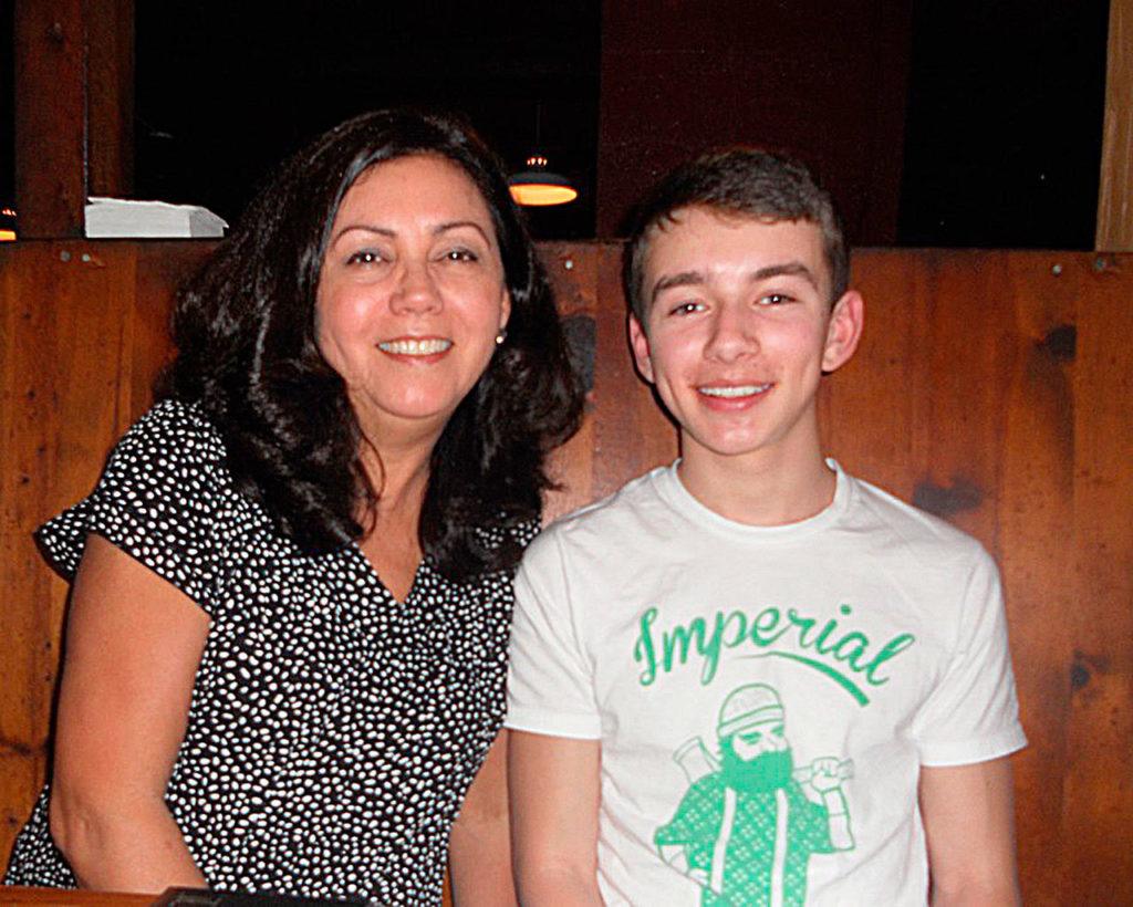 Matthew Truax with his mother, Melinda Truax, while on spring break in California in 2013. Matthew, 16, died Sept. 13, 2013, after collapsing on the Meadowdale High School track during PE class. (Truax family photo)
