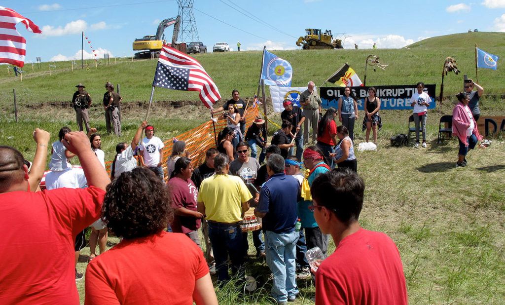 In this Aug. 12 photo, Native Americans protest the Dakota Access oil pipeline near the Standing Rock Sioux reservation in southern North Dakota. (AP Photo/James MacPherson, File)
