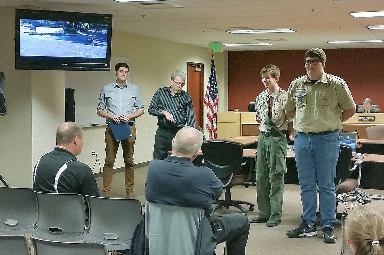 At a Sept. 19 meeting, Mountlake Terrace staff (from left) Dustin DeKoekkoek and Ken Courtmanch thank Eagle Scout candidates Dustyn Stelter and Reagan Tedrow for their work at Evergreen Playfield. (Contributed photo)