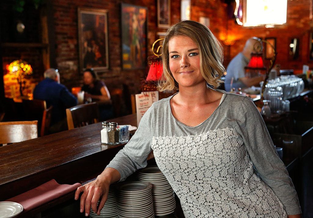 Jim and Karen’s granddaughter Amber Lang began busing tables in one of Jim and Karen’s restaurants when she was 15. Now she is the manager of the Vintage Cafe in Everett. (Dan Bates / The Herald)
