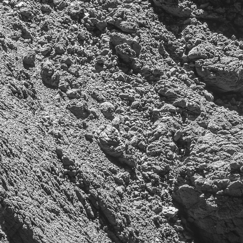 The comet lander Philae is seen in a crack on the right side of a photo taken by Rosetta’s OSIRIS narrow-angle camera Friday from a distance of 2.7 km of the Comet 67P/Churyumov–Gerasimenko. (ESA/Rosetta/MPS for OSIRIS via AP)
