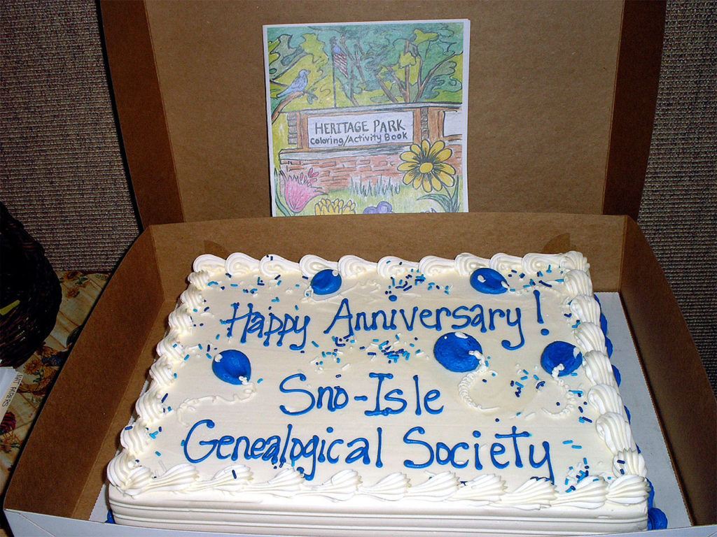 The Sno-Isle Genealogical Society celebrates its 30th anniversary in September. At its Sept. 7 meeting, the group celebrated with a cake. A special coloring and activity book created for the milestone also is available. (Contributed photo)
