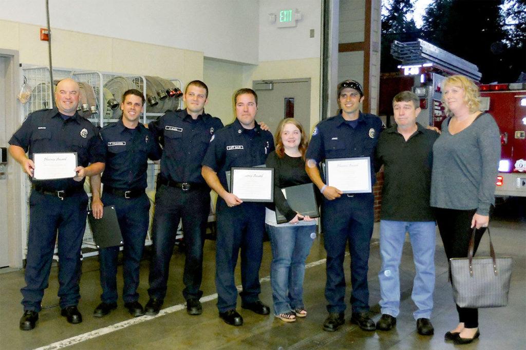 The Marysville Fire District Phoenix Award was presented to firefighter Josh Duncan, firefighter Chad Solbakken, firefighter Josh Olsen, Capt. Basil Bailey, SNOPAC dispatcher Kate Dotson, and firefighter paramedic Eric Jones for their roles in saving the life of Jay Byram, whose wife, Jill Byram, administered CPR until help arrived. Not pictured are Capt. Keith Terry and firefighter paramedic Brandon Mauer. (Contributed photo)
