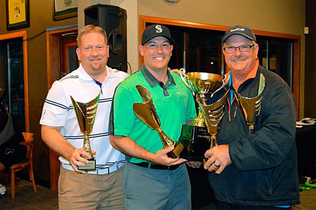 Defending mens team champions, “Team Green” — from left, Jerry Sluman, Jay Niersteimer and Kevin Hanson — display their winning trophies at the Calvary Open Golf Tournament, held Aug. 27 at Kayak Point Golf Course. The 2016 event raised over $3,000 for Operation Christmas Child, a program of Samaritan’s Purse that sends gifts and necessities in shoebox-sized packages to children in impoverished areas of the world. Over 140 golfers took part. Teams that brought filled shoeboxes lowered their score by one stroke. The annual tournament is hosted by Calvary Arlington church. To learn more, go to calvaryopen.org. (Contributed photo)
