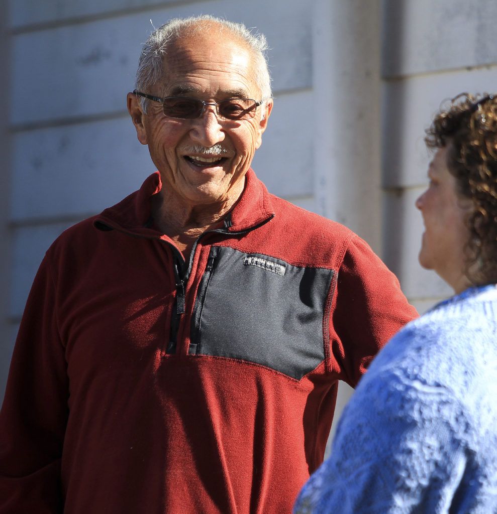 Al Taniguchi, a member of the The Seven Lakes Baptist Church, is helping to restore the siding of his church with help from the Lakewood ward of the Church of Jesus Christ of Latter-day Saints. “It’s a real blessing for us,” Taniguchi said. (Ian Terry / The Herald)
