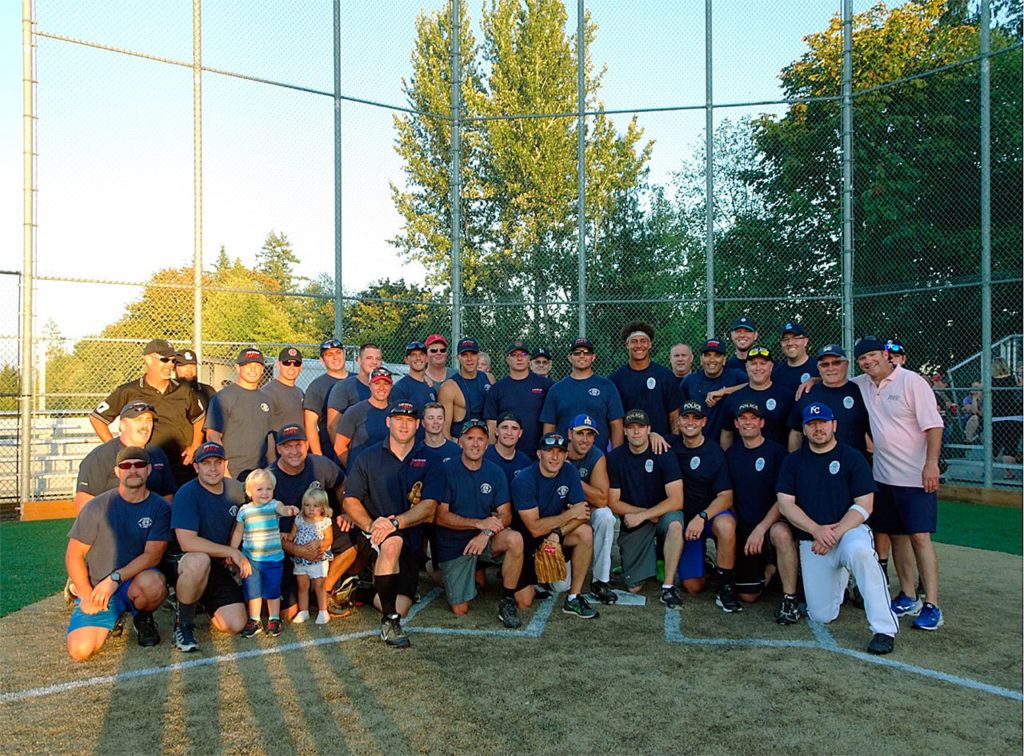 Lake Stevens police officers and firefighters competed in an annual Guns ‘n’ Hoses charity softball game Aug. 18. Fire won the game, 16-9. (Contributed photo)