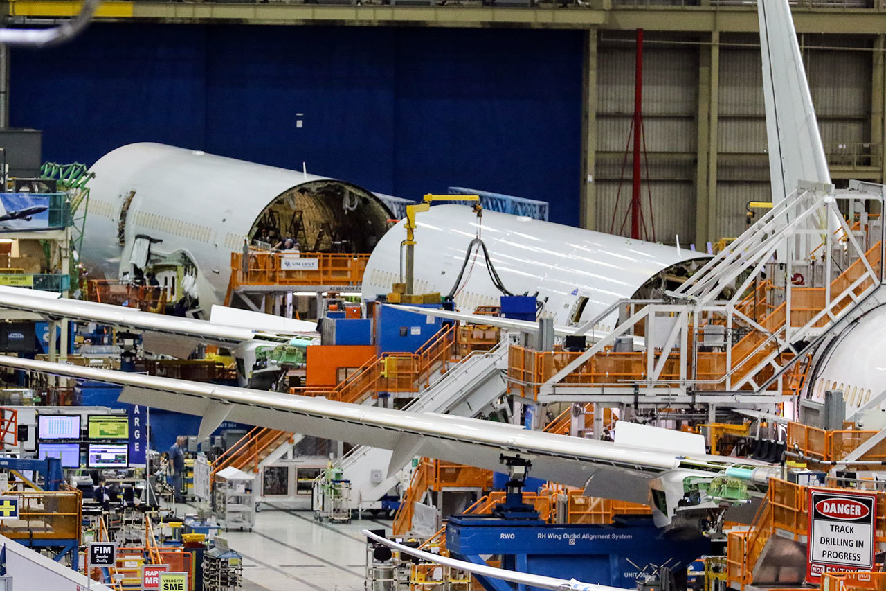 Currently in many pieces, the fuselage of the 500th 787is being assembled in Everett.
(Kevin Clark / The Herald)
