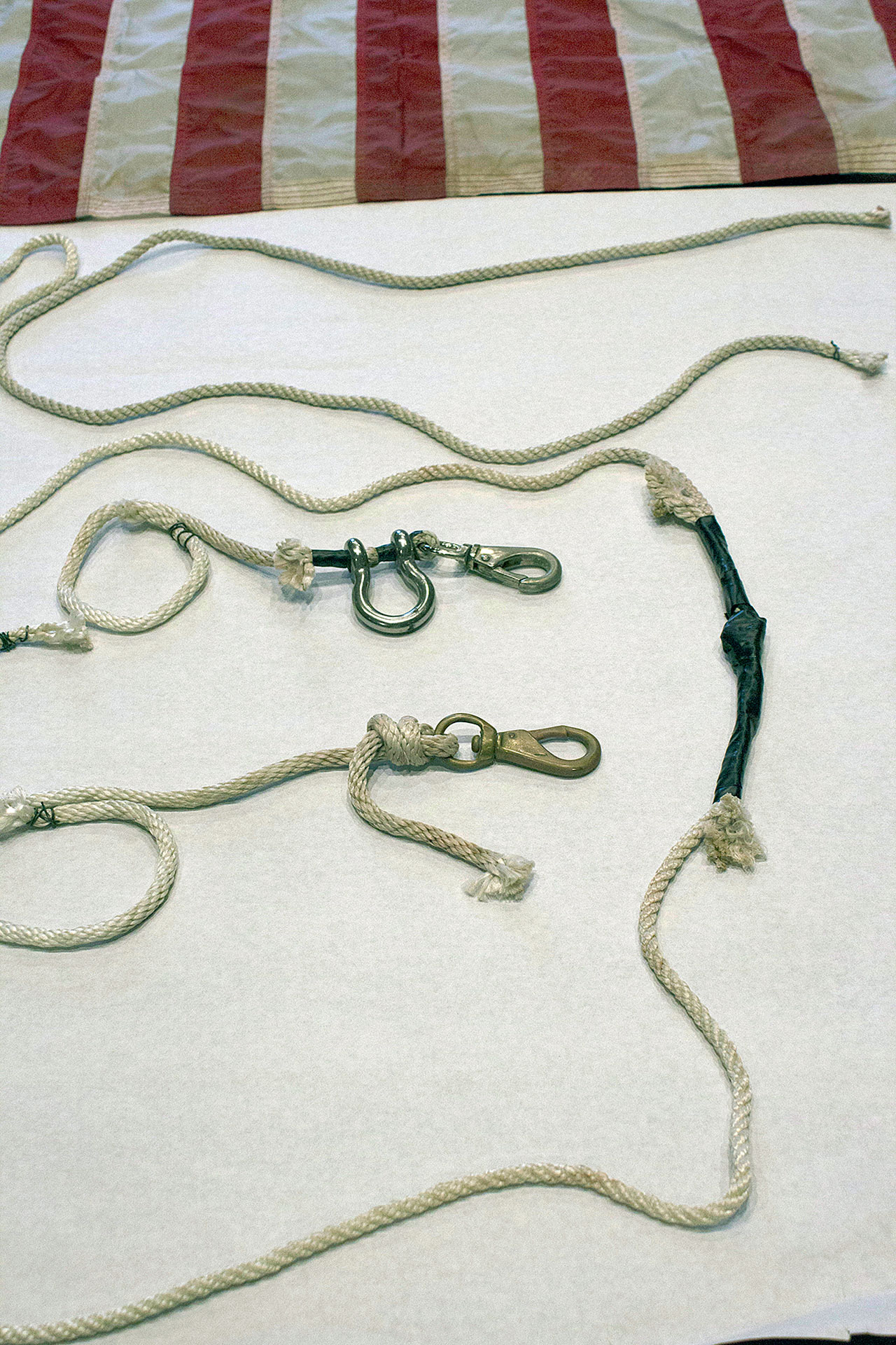A flag, which is believed to be linked to a famous photo of ground zero in New York after the Sept. 11, 2001, terrorist attacks, turned up in Everett in 2014 when an unidentified man dropped it off at a fire station. The ropes and hardware attached to it underwent a lengthy forensic analysis. (City of Everett)

