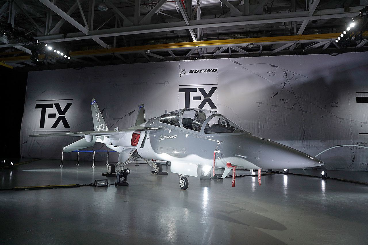 Boeing’s T-X aircraft is shown during an event to reveal the proposed trainer Tuesday in St. Louis. Boeing and its partner Saab are competing against several other military contractors to win the bid to build as many as 350 of the aircraft to replace the aging T-38 used by the U.S. Air Force to train pilots. (AP Photo/Jeff Roberson)