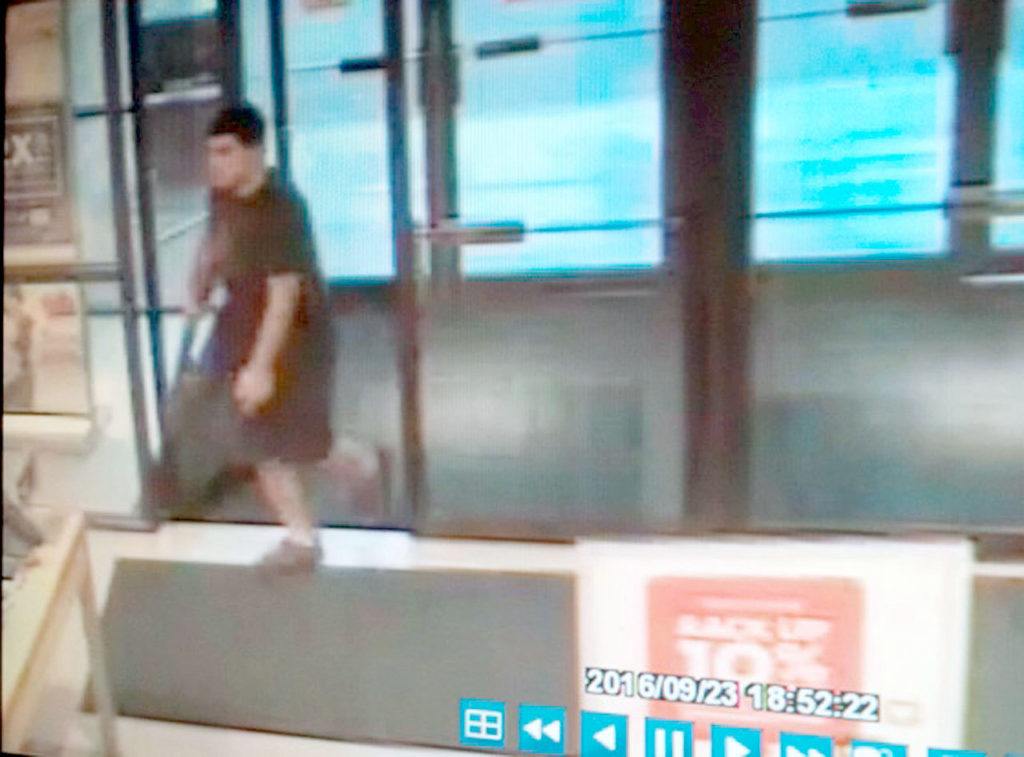 This frame from surveillance video provided by the Washington State Patrol shows the suspect in a shooting rampage at Cascade Mall in Burlington on Friday. (Washington State Patrol via AP) 
