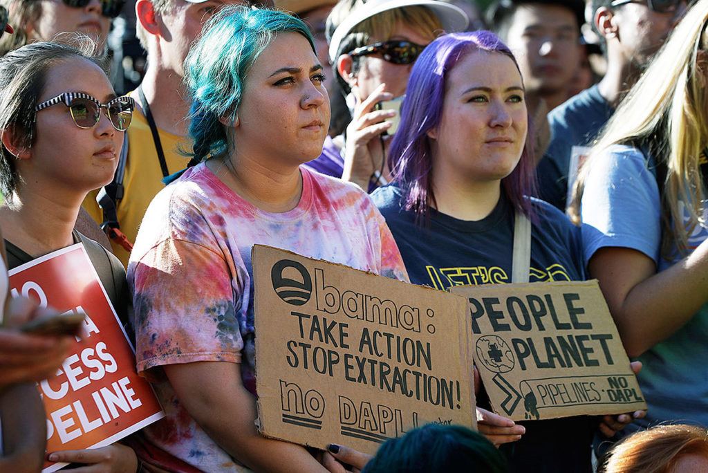 Supporters of the Standing Rock Sioux Tribe attend a rally in opposition of the Dakota Access oil pipeline, during a rally in Lafayette Park near the White House, on Tuesday in Washington. The company developing the $3.8 billion Dakota Access pipeline says it is committed to the project, despite strong opposition and a federal order to halt construction near an American Indian reservation in North Dakota. (AP Photo/Jacquelyn Martin)
