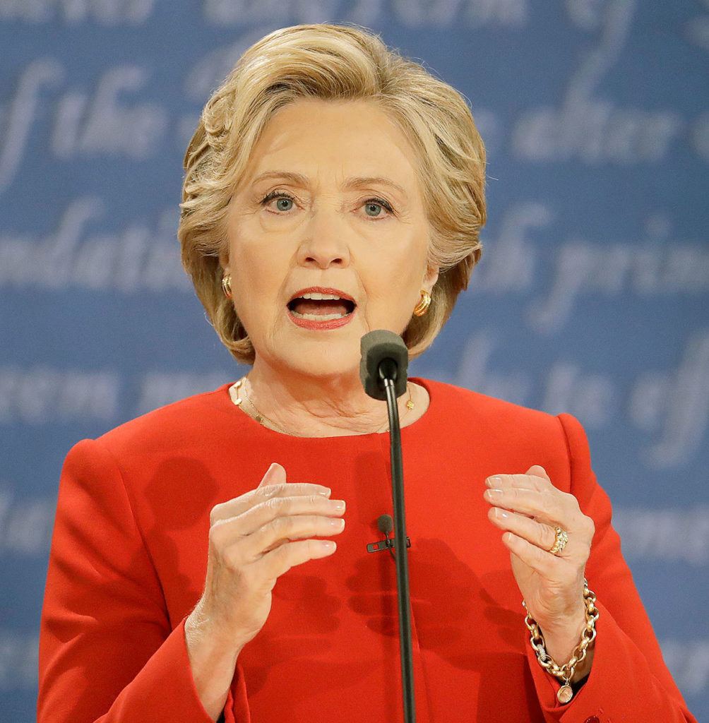 Democratic presidential nominee Hillary Clinton speaks during the presidential debate with Republican presidential nominee Donald Trump at Hofstra University in Hempstead, New York, on Monday. (AP Photo/Julio Cortez)
