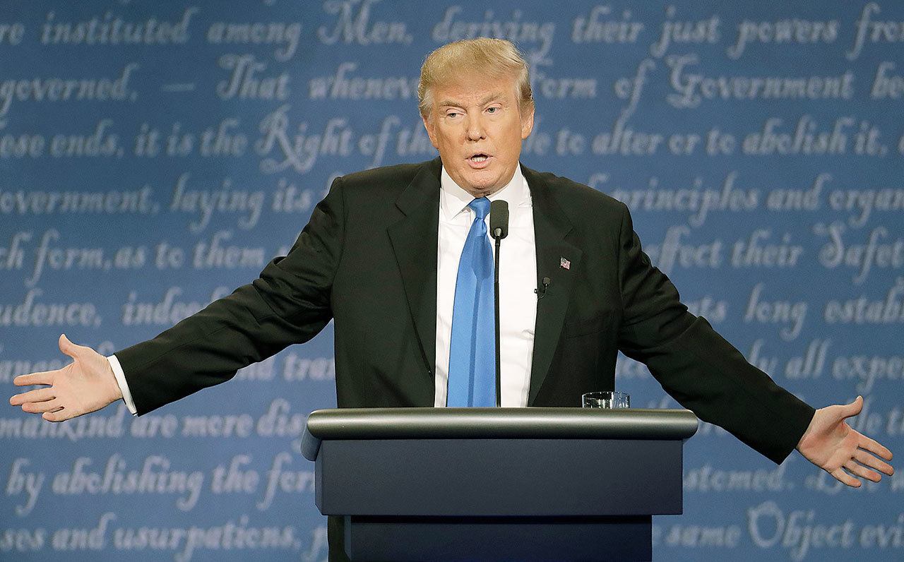 Republican presidential nominee Donald Trump speaks to Democratic presidential nominee Hillary Clinton during the presidential debate at Hofstra University in Hempstead, N.Y., Monday, Sept. 26, 2016. (AP Photo/Patrick Semansky)