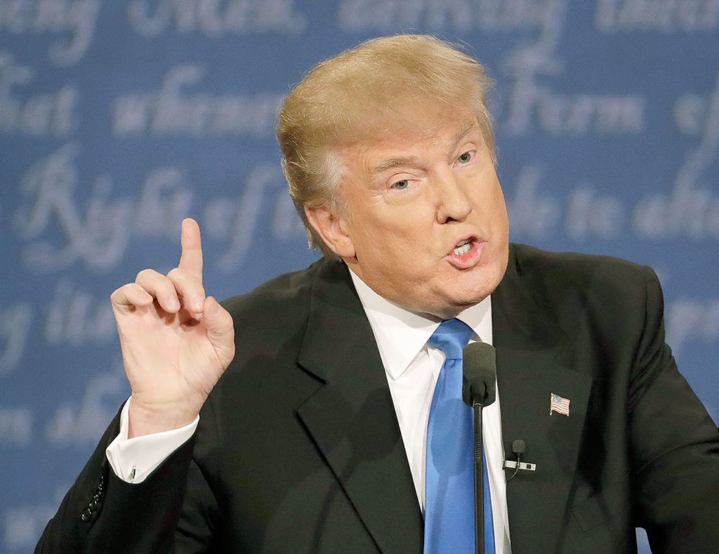 Republican presidential nominee Donald Trump speaks during the presidential debate with Democratic presidential nominee Hillary Clinton at Hofstra University in Hempstead, New York, on Monday. (AP Photo/Patrick Semansky)

