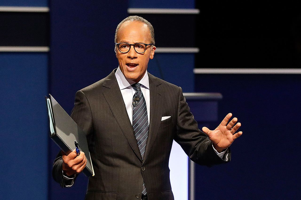 Moderator Lester Holt, anchor of NBC Nightly News, talks with audience before the presidential debate at Hofstra University in Hempstead, New York, on Monday. (AP Photo/David Goldman)