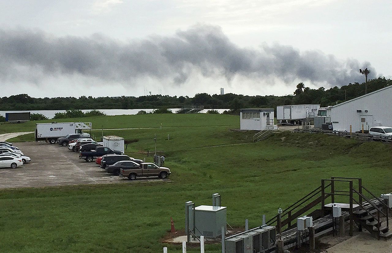 Smoke rises from a SpaceX launch site Sept. 1 at Cape Canaveral, Florida. NASA said SpaceX was conducting a test firing of its unmanned rocket when a blast occurred. (AP Photo/Marcia Dunn)