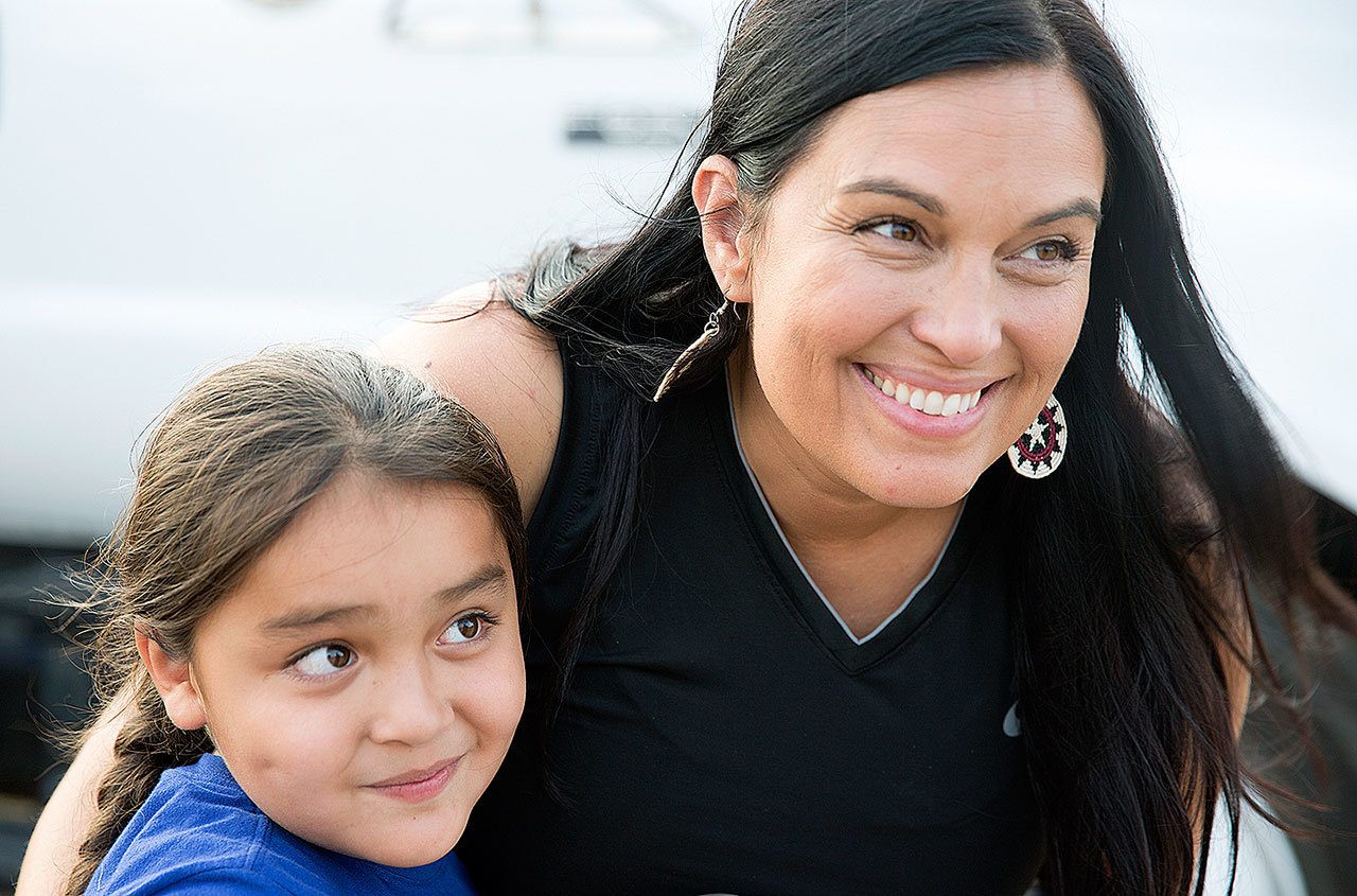 Deborah Parker, seen her with her son, Wetuah Dewey, is a member of the Tulalip Tribes and is part of the protests in North Dakota. (Photo by Nancy Bleck, Slangy Sp’ak’wus)