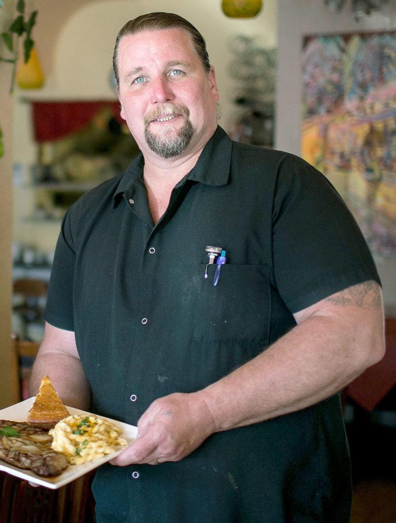 Edward “Chef Rocky” Trabue is still serving up soul food at the Ole Soul Southern Creole bistro he opened after his “firing” on “Kitchen Nightmares.” (Herald file photo)
