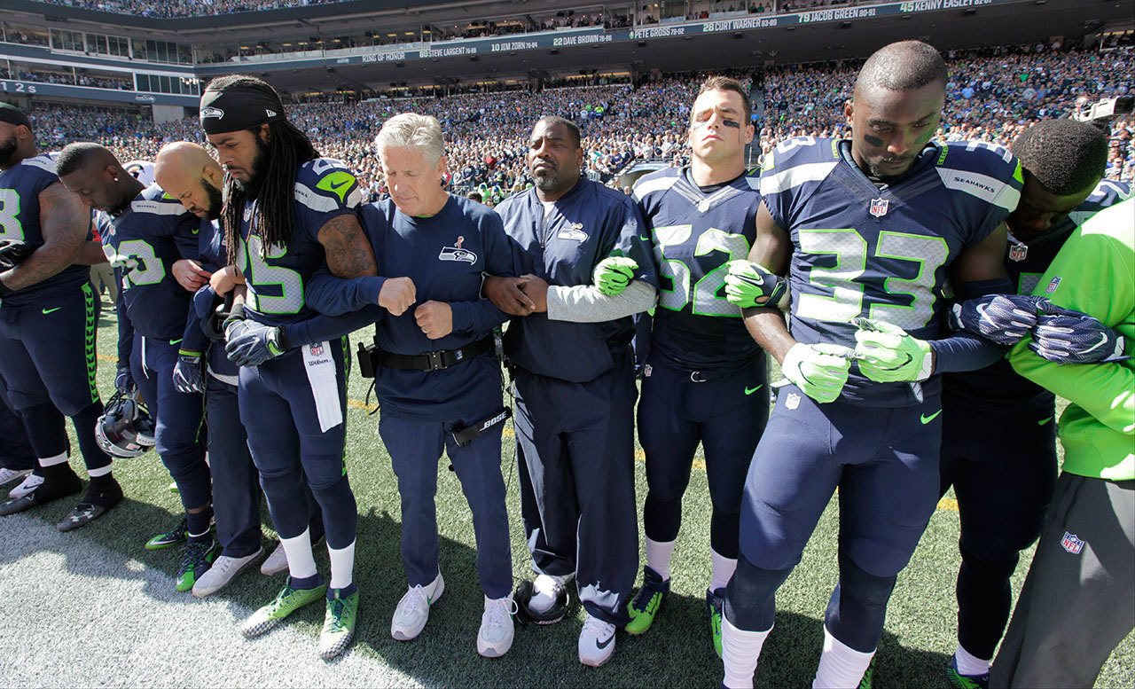 Seahawks open season with show of unity
