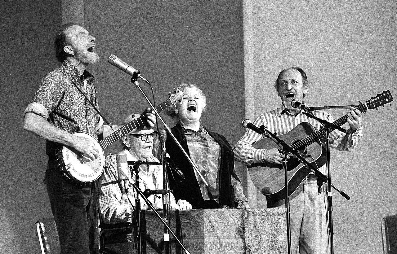 In this Nov. 28, 1980, photo, the Weavers perform in a 25th Anniversary reunion concert at Carnegie Hall in New York. From left are: Pete Seeger, Lee Hays, Ronnie Gilbert and Fred Hellerman. Hellerman died Thursday at his home in Weston, Connecticut, after a lengthy illness, his son Caleb Hellerman said. He was 89. (AP Photo/Richard Drew, File)