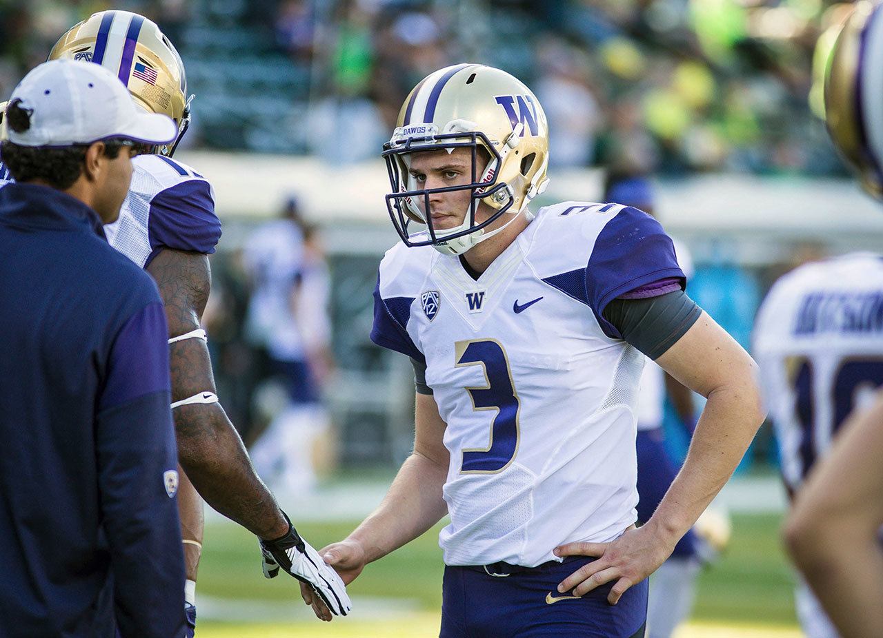 Washington quarterback Jake Browning (3) leads the nation in touchdown passes and passing efficiency. (AP Photo/Thomas Boyd)