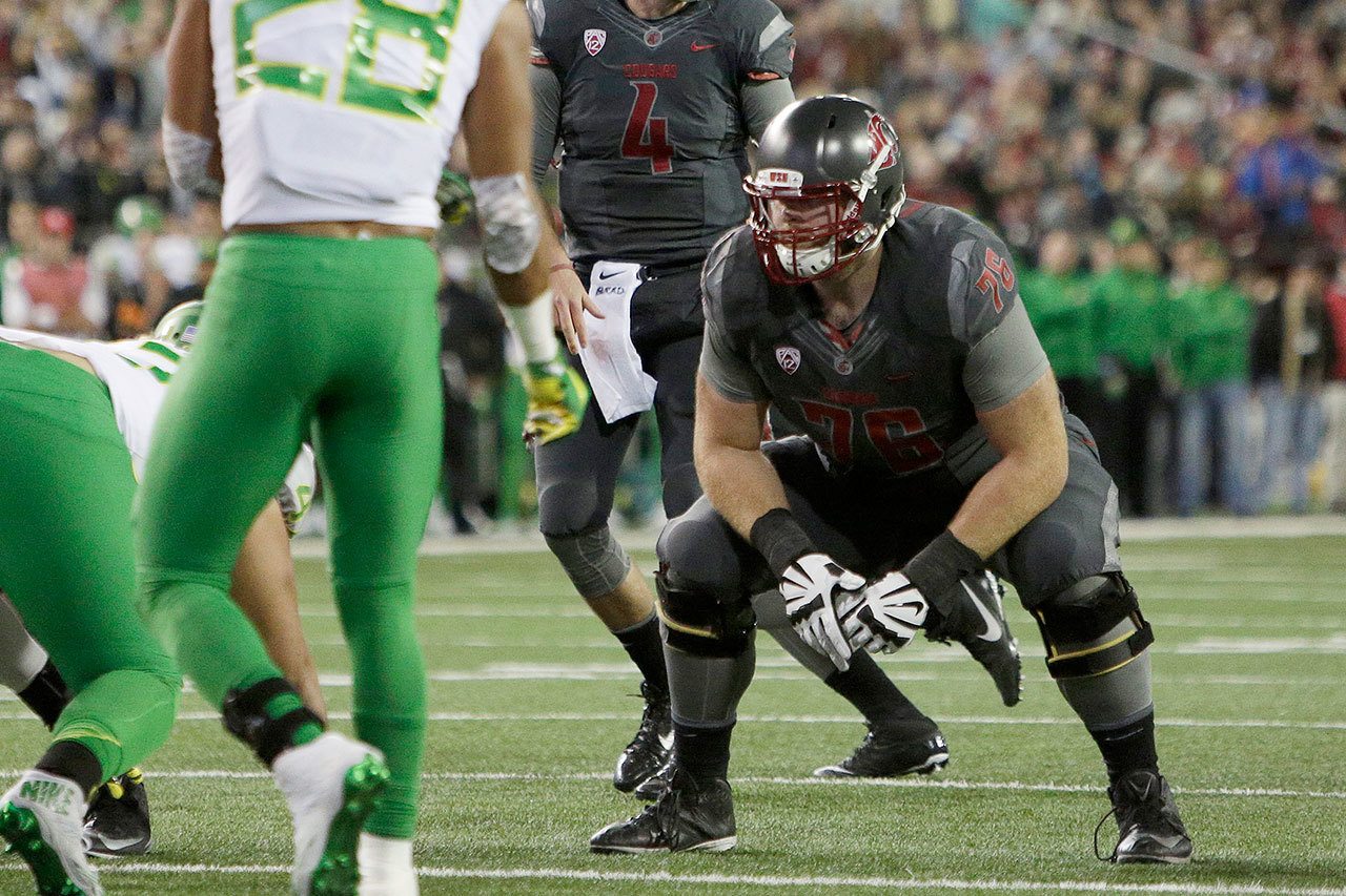 Washington State offensive lineman Cody O’Connell (76) waits for the snap during the first half of a game against Oregon on Oct. 1 in Pullman. (AP Photo/Young Kwak)