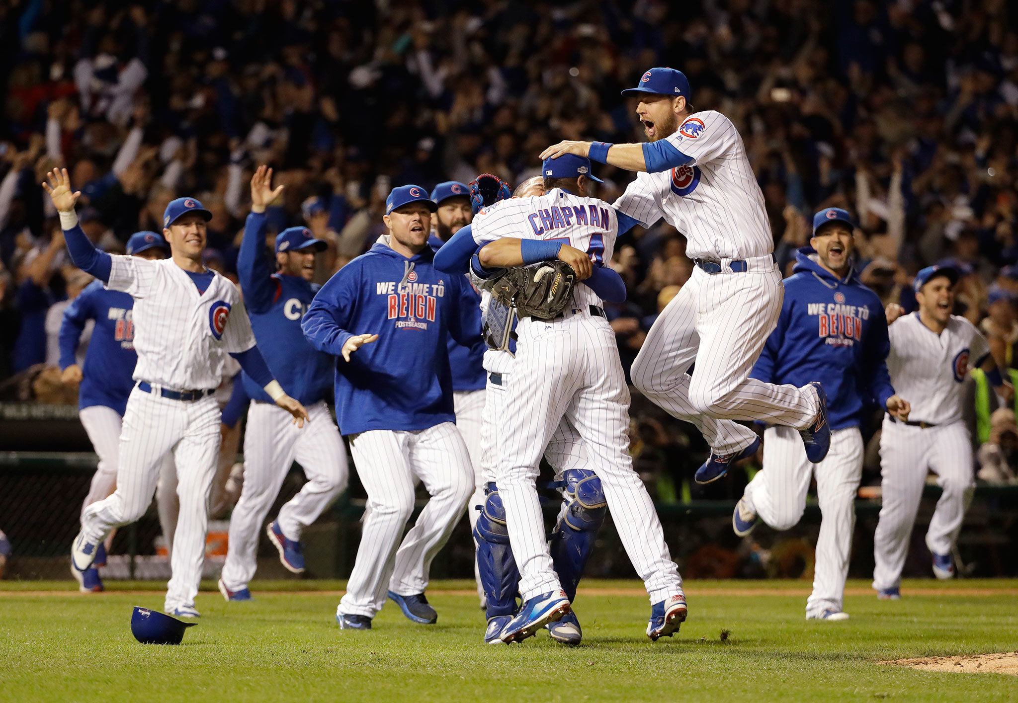 Cubs players celebrate after Game 6 of the National League Championship Series against the Dodgers on Saturday in Chicago. The Cubs won 5-0 to win the series and advance to the World Series against the Indians. (AP Photo/David J. Phillip)