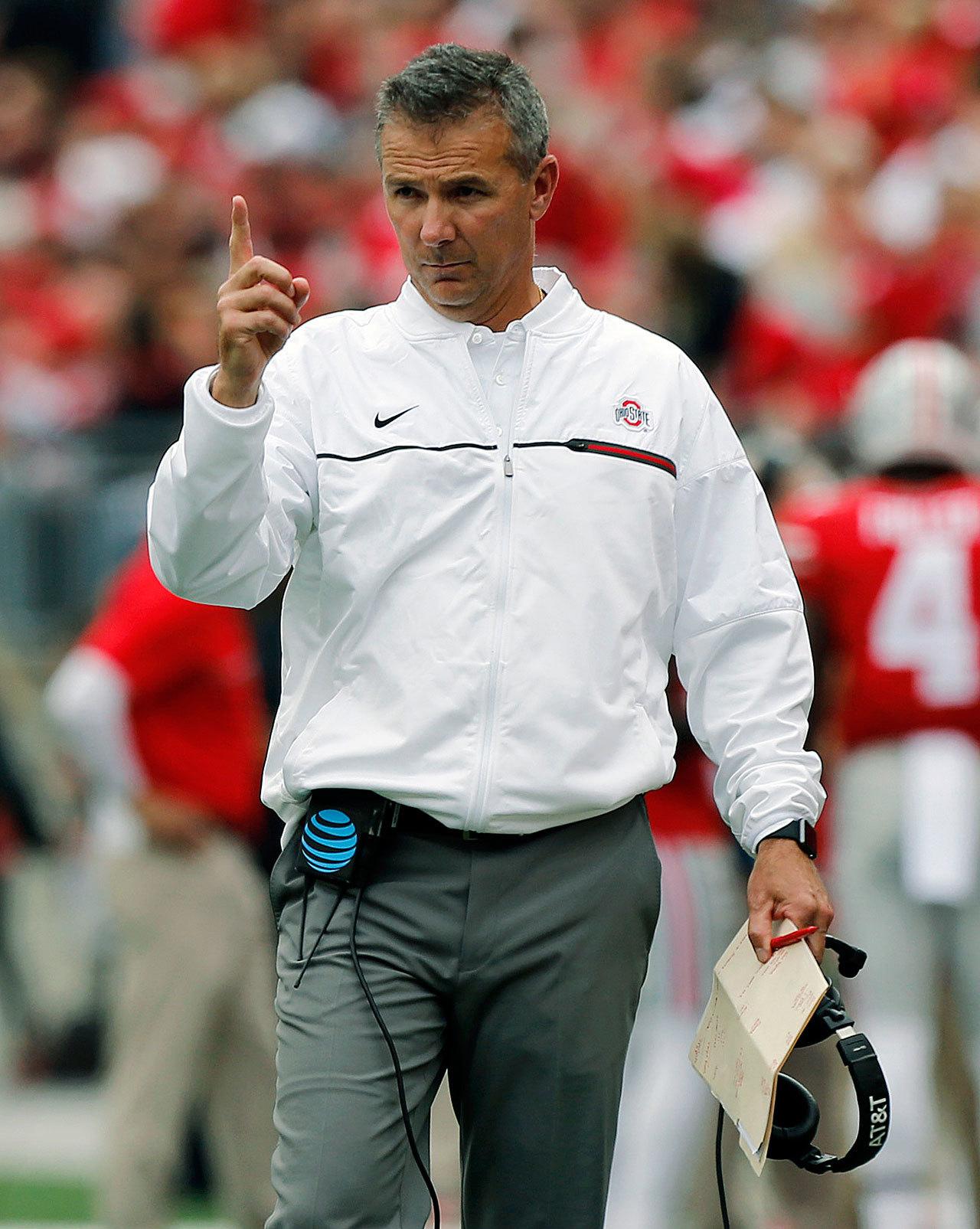 Ohio State football coach Urban Meyer, shown here in a game against Rutgers earlier this season, has issues with some of the proposed reforms to the college football recruiting process. (AP Photo/Jay LaPrete)