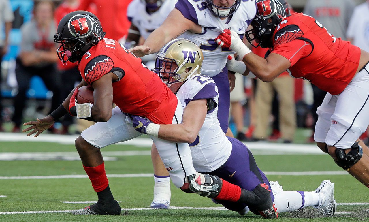 No. 4 Washington hangs on to beat No. 17 Utah 31-24