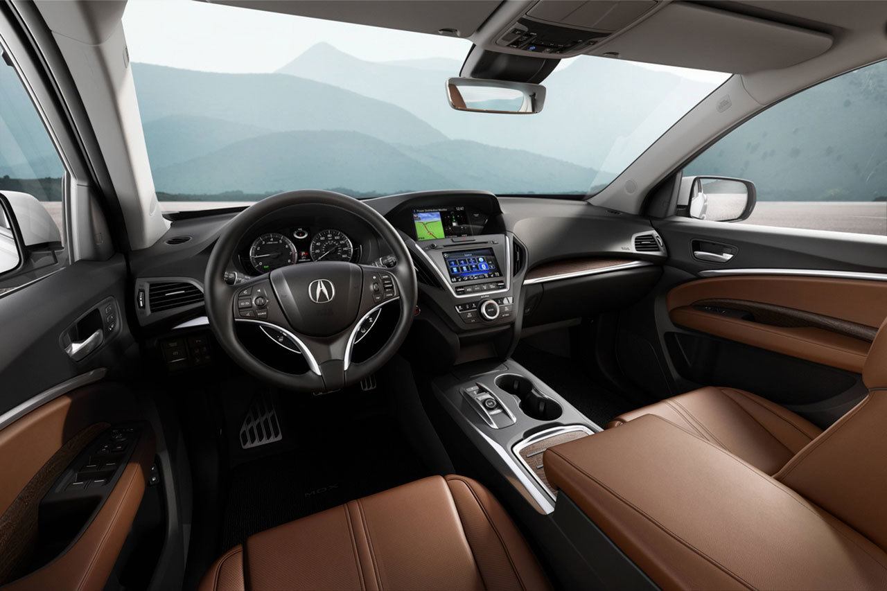 The 2017 Acura MDX has comfortable, solidly constructed front seats and lots of storage spots for personal items. (Manufacturer photo)