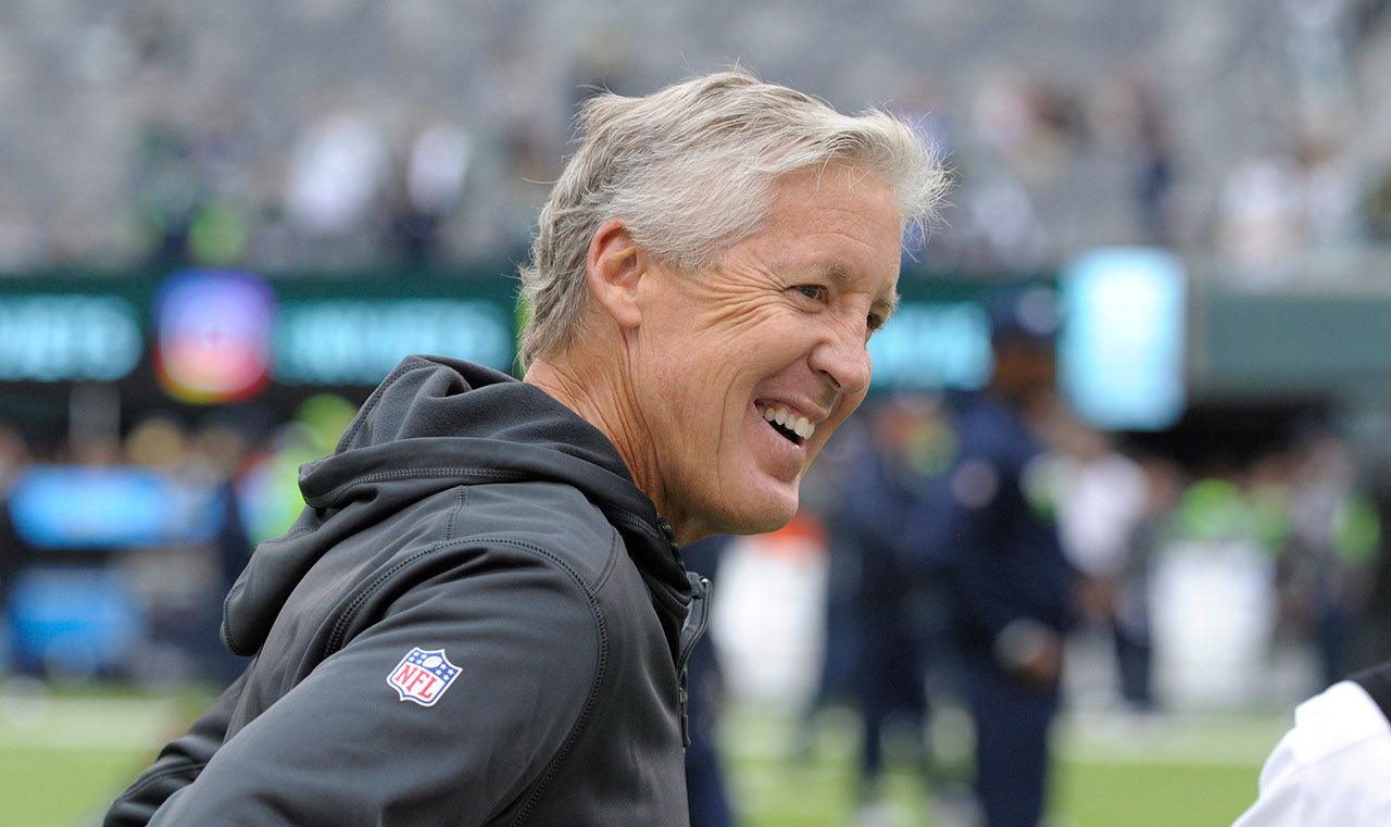 Seattle Seahawks coach Pete Carroll smiles his team’s game against the New York Jets on Sunday in East Rutherford, N.J. (AP Photo/Bill Kostroun)
