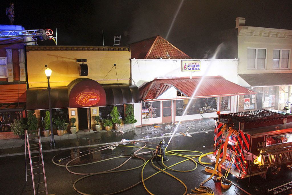 Crews battle an explosive fire in downtown Arlington on Monday evening. (Photo courtesy of City of Arlington)
