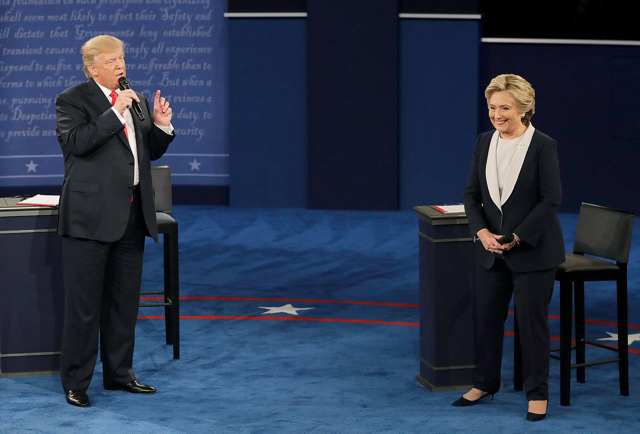 Republican presidential nominee Donald Trump speaks to Democratic presidential nominee Hillary Clinton during the second presidential debate at Washington University in St. Louis on Sunday. (AP Photo/Patrick Semansky)